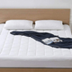 Oaskys Cooling Mattress Pad | $43 | Amazon